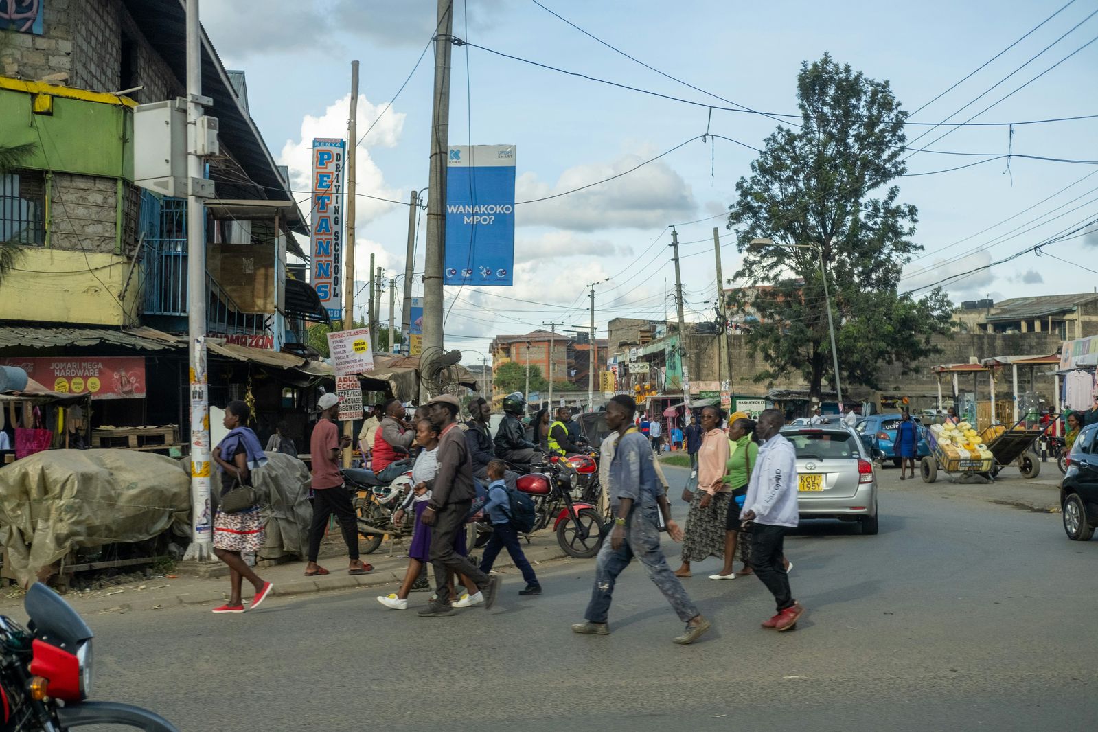 Nairobi Kenya street market urban mobility traffic